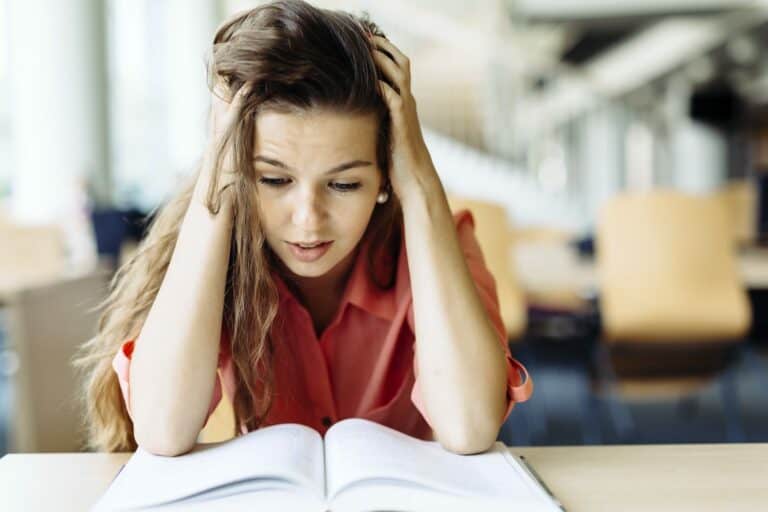 Female student studying in library